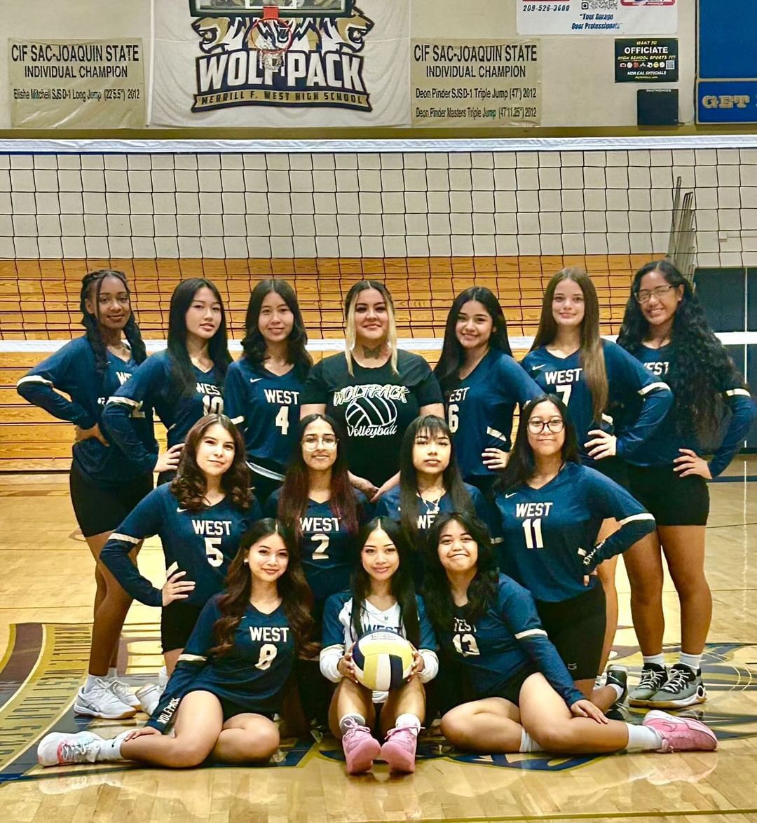 The Jv girls Volleyball team posing for a picture!