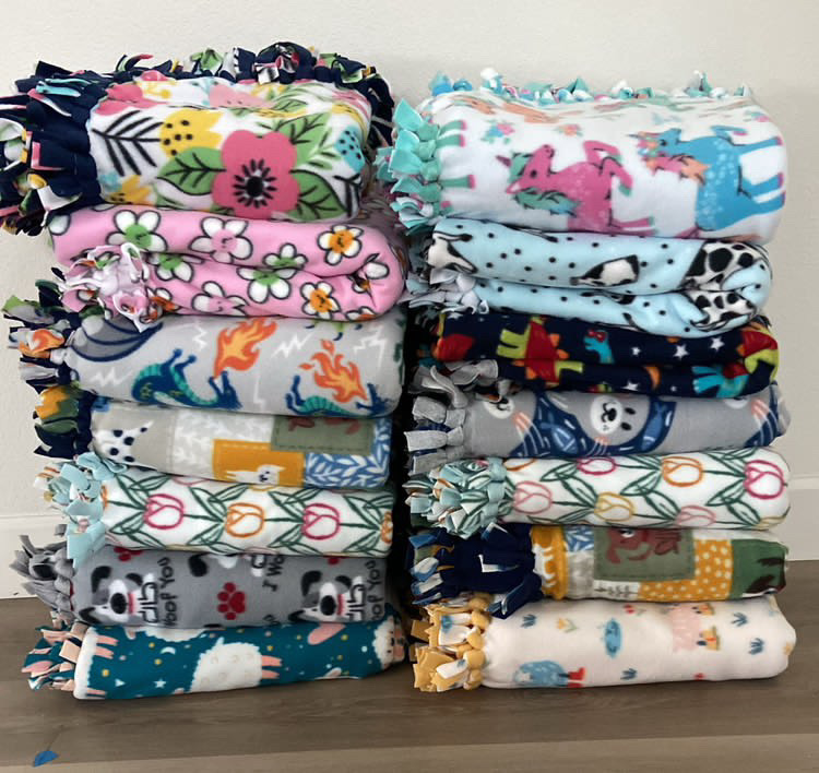 Blankets donated to the McHenry House in December 2024 are shown. 
