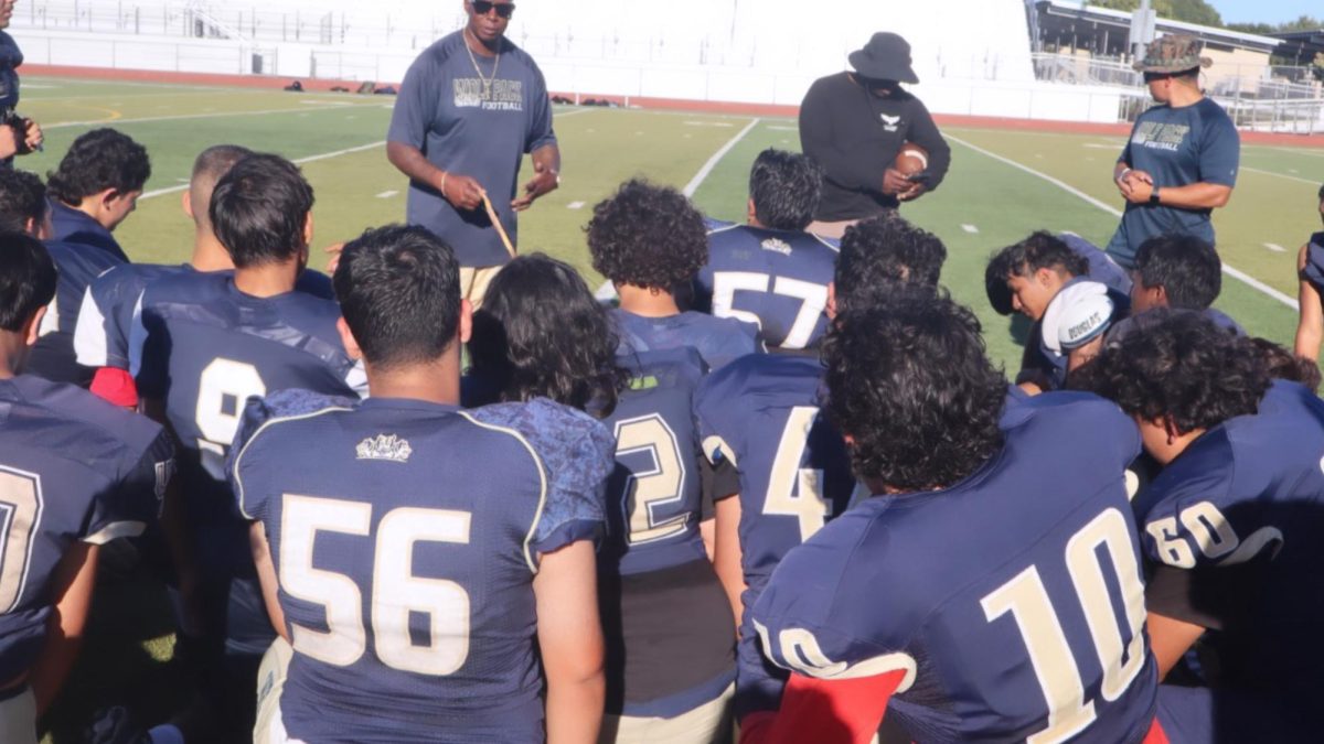 JV team kneeling down 